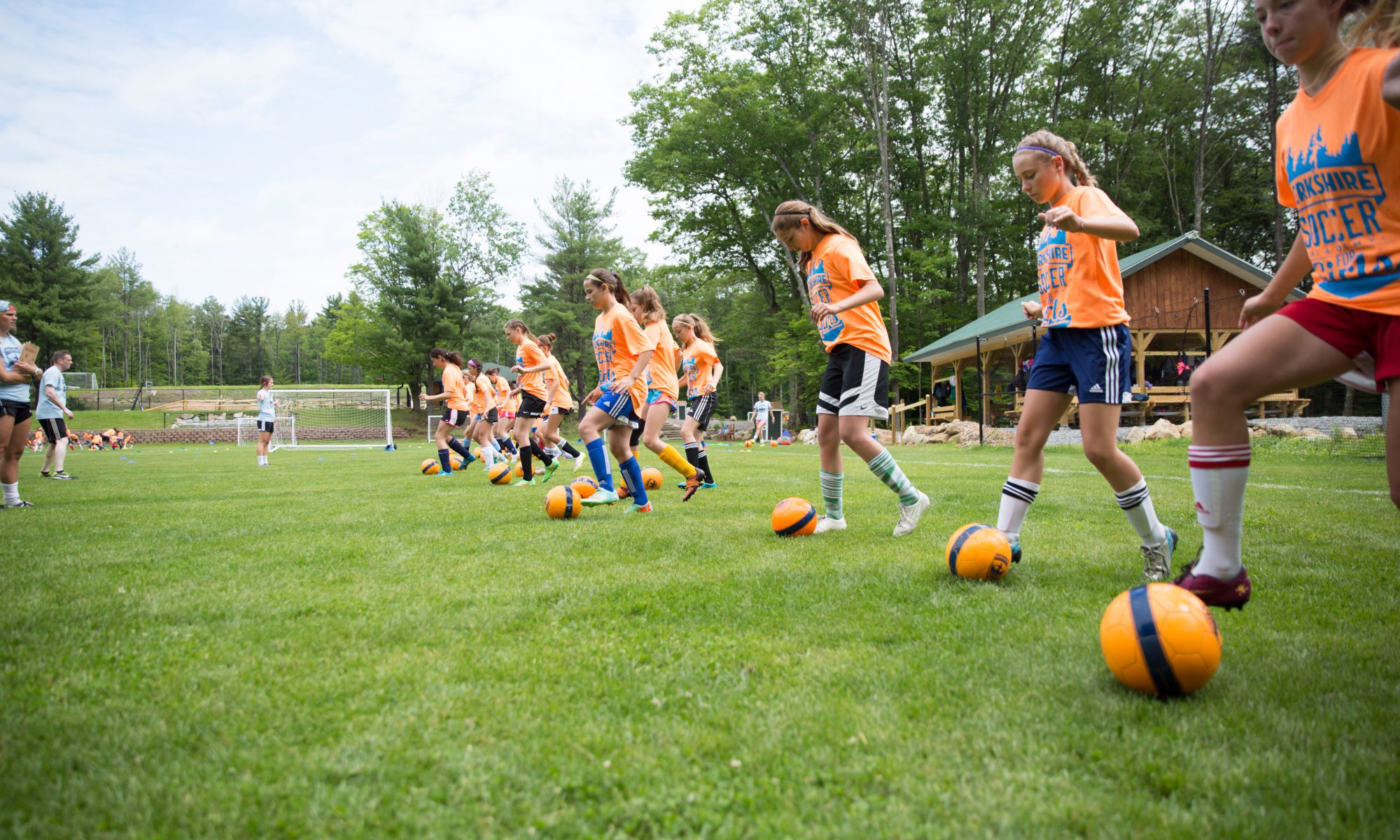 berkshire girls playing soccer at summer camp