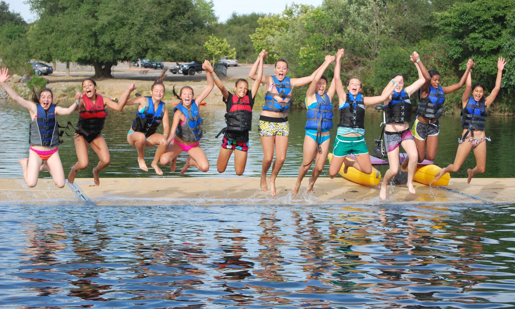 sacramento state aquatic centre kids jumping into the lake